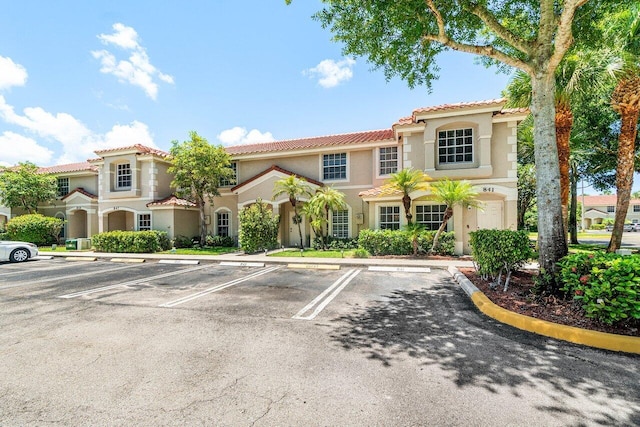 841 Summit Lake Dr, West Palm Beach, FL 33406 - view of building exterior featuring uncovered parking
