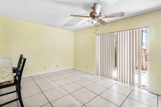 841 Summit Lake Dr, West Palm Beach, FL 33406 - spare room featuring a ceiling fan and light tile patterned flooring