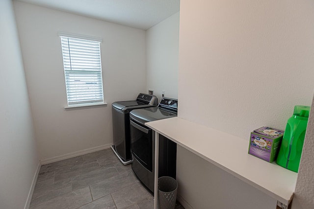 10782 SW Vasari Way, Port Saint Lucie, FL 34987 - laundry room featuring independent washer and dryer and baseboards