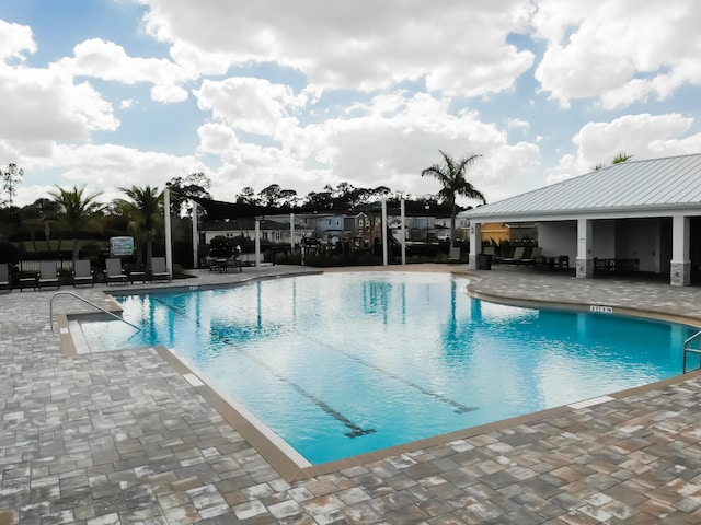 10782 SW Vasari Way, Port Saint Lucie, FL 34987 - community pool featuring a patio