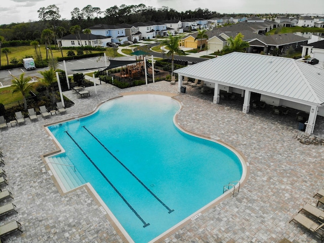 10782 SW Vasari Way, Port Saint Lucie, FL 34987 - community pool featuring a patio area, a residential view, and a gazebo