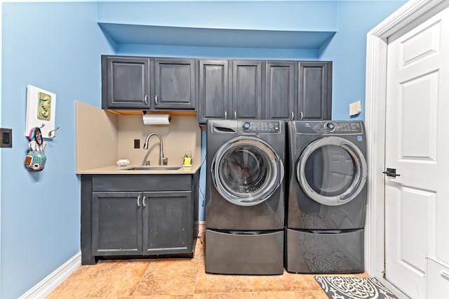 908 SW Squire Johns Ln, Palm City, FL 34990 - laundry room featuring cabinet space and independent washer and dryer