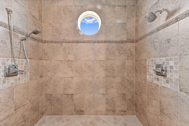 908 SW Squire Johns Ln, Palm City, FL 34990 - bathroom with a tile shower
