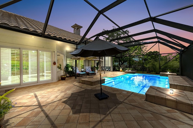 908 SW Squire Johns Ln, Palm City, FL 34990 - swimming pool with a patio and a lanai