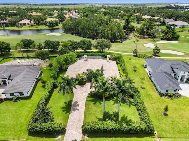 908 SW Squire Johns Ln, Palm City, FL 34990 - aerial perspective of suburban area with a local golf course and a nearby body of water