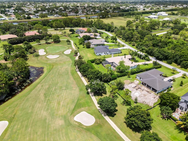 908 SW Squire Johns Ln, Palm City, FL 34990 - aerial overview of property's location with nearby suburban area, a golf club, and a large body of water