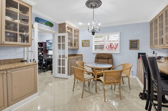2 Fairway Dr, Boynton Beach, FL 33436 - dining area featuring a desk, crown molding, french doors, and a chandelier