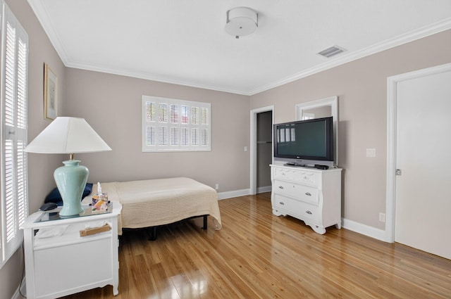 2 Fairway Dr, Boynton Beach, FL 33436 - bedroom featuring light wood-type flooring and ornamental molding