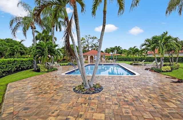 2 Fairway Dr, Boynton Beach, FL 33436 - community pool with a patio area
