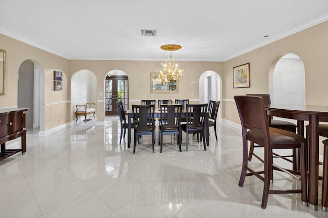2 Fairway Dr, Boynton Beach, FL 33436 - dining room with arched walkways, ornamental molding, a chandelier, and light marble finish floors