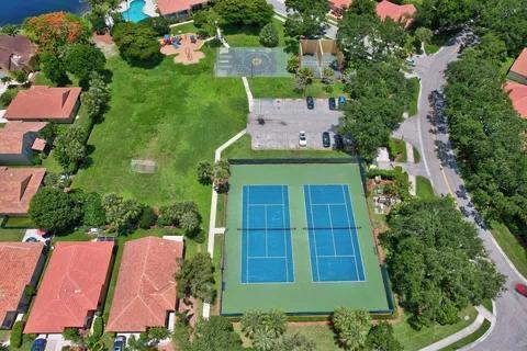 5129 Elpine Way, Riviera Beach, FL 33418 - aerial view of property and surrounding area with a pool