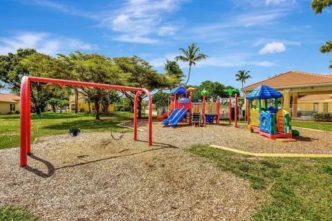 5129 Elpine Way, Riviera Beach, FL 33418 - community jungle gym with a yard