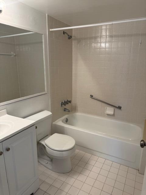 717 Sunny Pine Way Unit A2, Greenacres, FL 33415 - full bath featuring tile patterned flooring, shower / washtub combination, and vanity