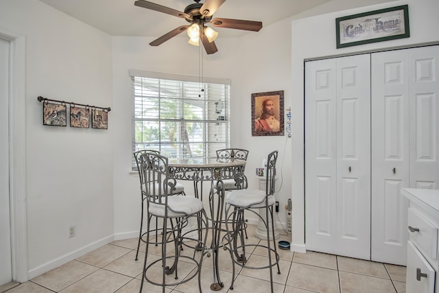 5064 El Claro Cir, West Palm Beach, FL 33415 - dining area with light tile patterned flooring and a ceiling fan