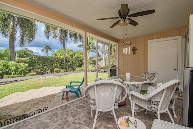 5064 El Claro Cir, West Palm Beach, FL 33415 - sunroom / solarium featuring ceiling fan and outdoor dining space