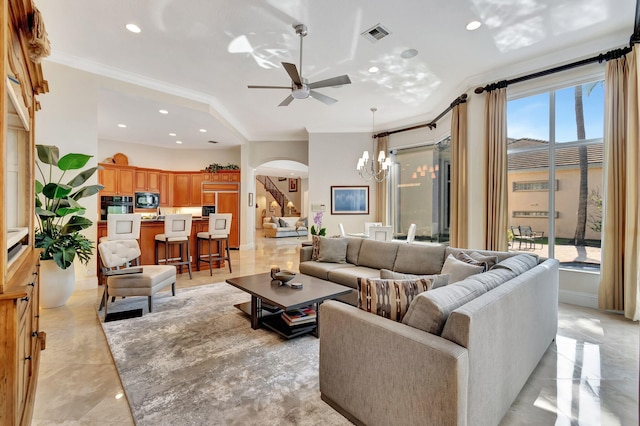 6404 Dorsay Ct, Delray Beach, FL 33484 - living room featuring arched walkways, ceiling fan, ornamental molding, recessed lighting, and a chandelier