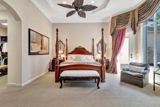 6404 Dorsay Ct, Delray Beach, FL 33484 - carpeted bedroom with arched walkways, access to outside, a tray ceiling, ornamental molding, and a ceiling fan