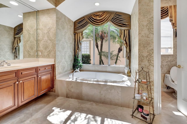 6404 Dorsay Ct, Delray Beach, FL 33484 - full bath with vanity, a garden tub, wallpapered walls, and recessed lighting