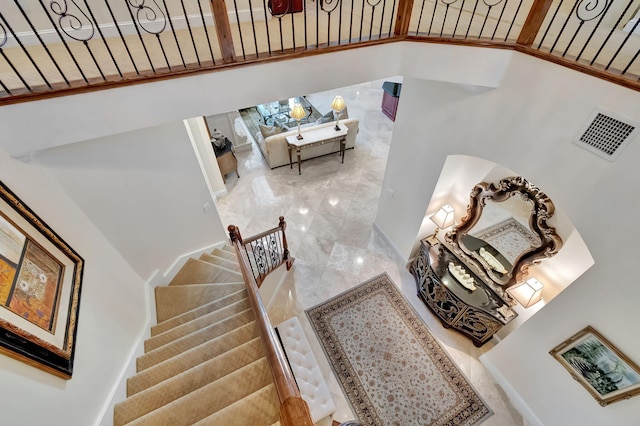 6404 Dorsay Ct, Delray Beach, FL 33484 - stairway with a high ceiling and marble finish floors