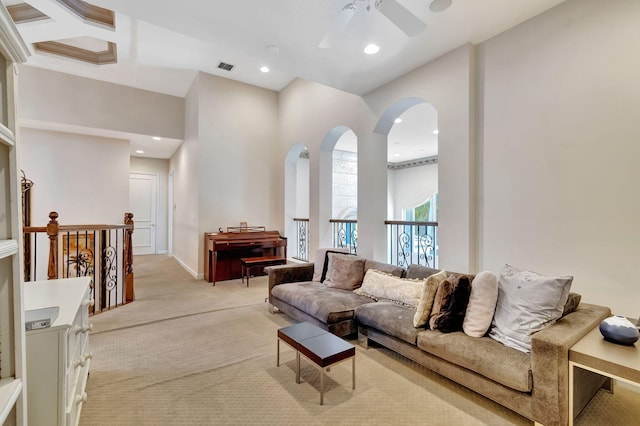 6404 Dorsay Ct, Delray Beach, FL 33484 - living room with light carpet, a ceiling fan, arched walkways, and recessed lighting