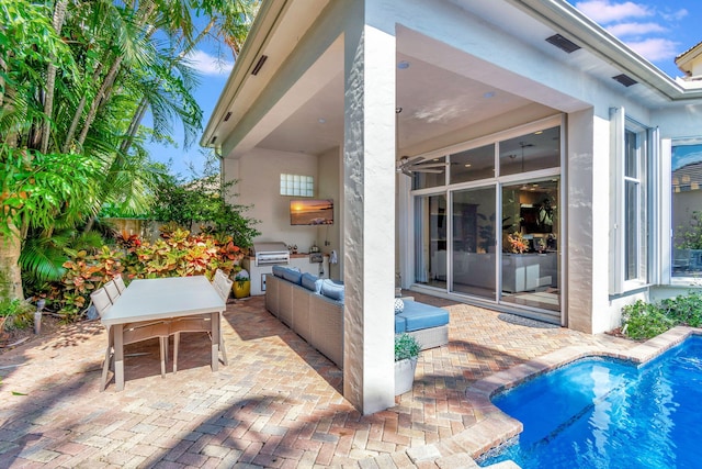 6404 Dorsay Ct, Delray Beach, FL 33484 - view of patio featuring exterior kitchen, an outdoor pool, and an outdoor hangout area