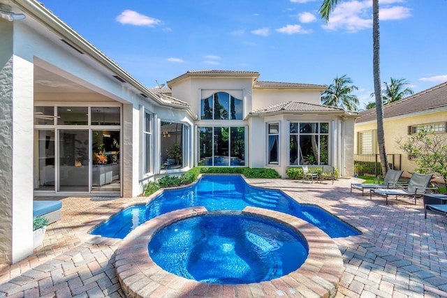 6404 Dorsay Ct, Delray Beach, FL 33484 - view of swimming pool with a patio and a pool with connected hot tub