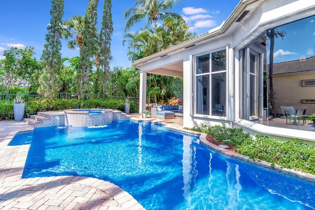 6404 Dorsay Ct, Delray Beach, FL 33484 - view of swimming pool with an outdoor hangout area, a pool with connected hot tub, and a patio area