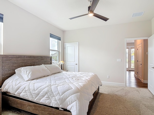 3121 Portofino Blvd, New Smyrna Beach, FL 32168 - carpeted bedroom with baseboards and a ceiling fan