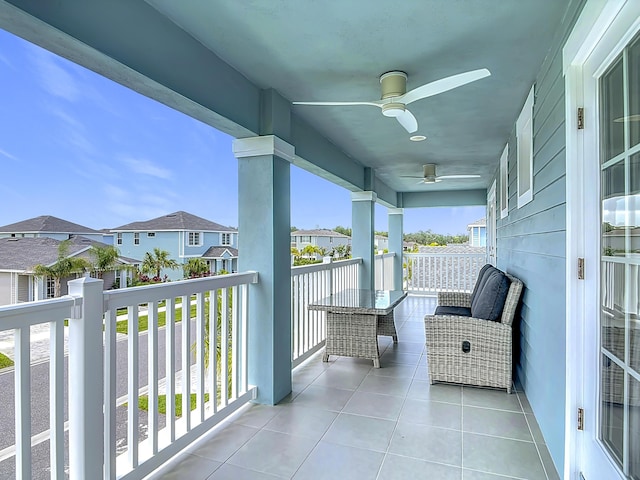 3121 Portofino Blvd, New Smyrna Beach, FL 32168 - balcony with ceiling fan and a residential view