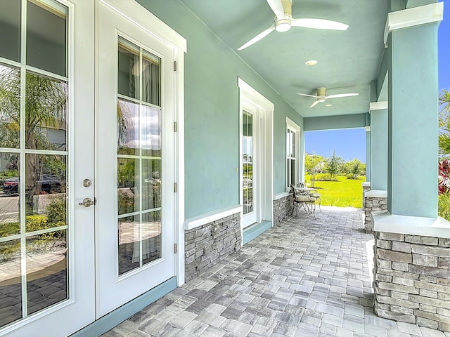 3121 Portofino Blvd, New Smyrna Beach, FL 32168 - view of patio / terrace featuring a ceiling fan and french doors