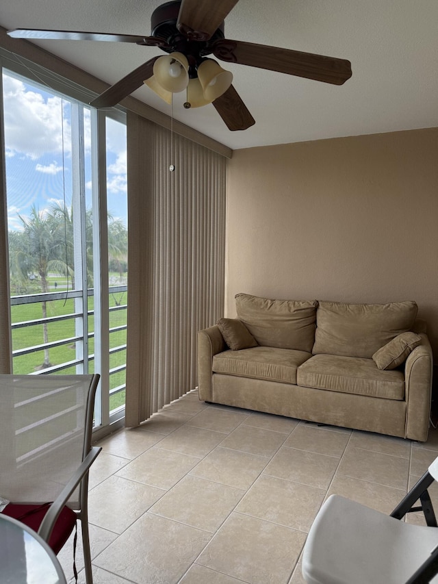 3007 Yarmouth Unit A, Boca Raton, FL 33434 - living room featuring ceiling fan, light tile patterned floors, and plenty of natural light