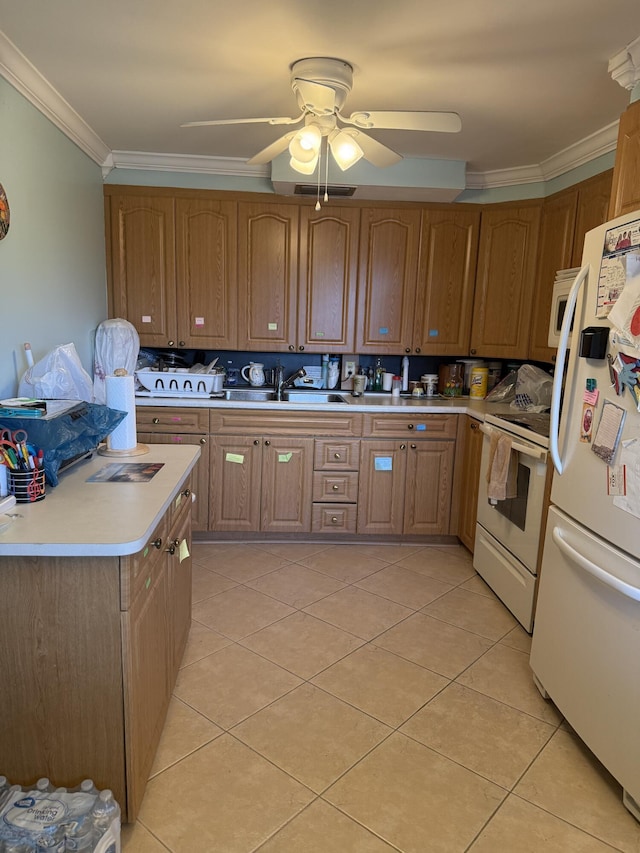 3007 Yarmouth Unit A, Boca Raton, FL 33434 - kitchen with white appliances, light tile patterned flooring, crown molding, light countertops, and a ceiling fan