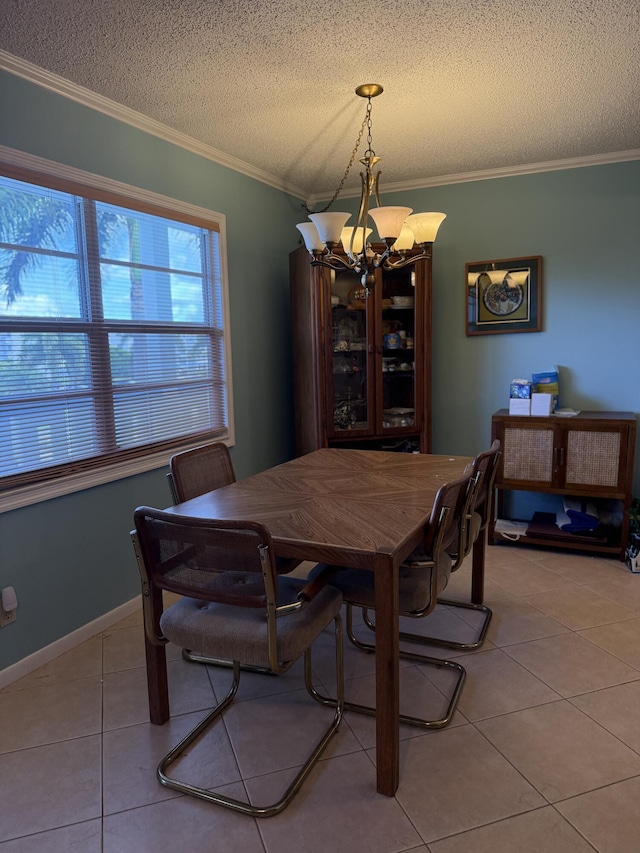 3007 Yarmouth Unit A, Boca Raton, FL 33434 - dining space featuring a chandelier, light tile patterned floors, a textured ceiling, and ornamental molding
