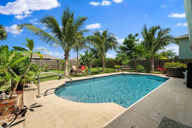2051 SW Pruitt St, Port Saint Lucie, FL 34953 - view of pool featuring a patio area and a fenced backyard