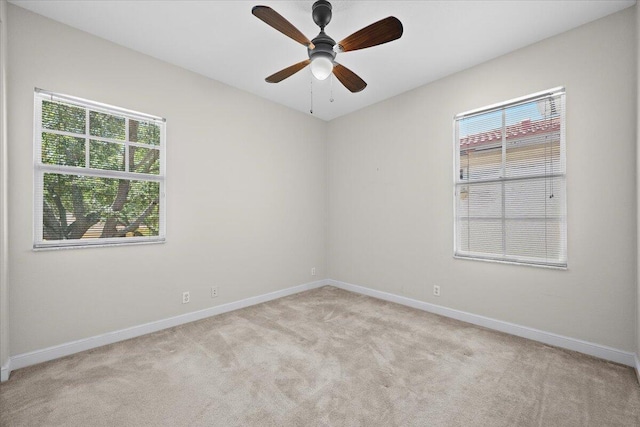 615 Castle Dr, Palm Beach Gardens, FL 33410 - unfurnished room featuring light carpet and ceiling fan
