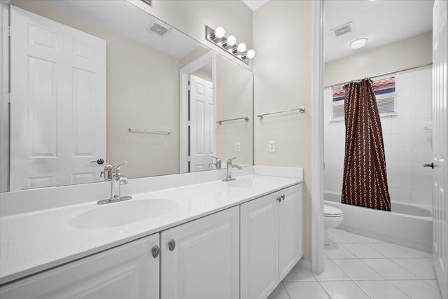 615 Castle Dr, Palm Beach Gardens, FL 33410 - bathroom featuring double vanity, shower / bath combo with shower curtain, and tile patterned flooring