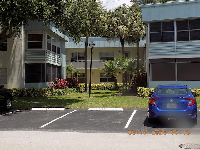 469 Normandy J 469, Delray Beach, FL 33484 - view of property with uncovered parking