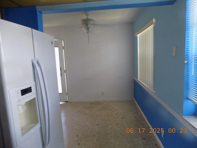 469 Normandy J 469, Delray Beach, FL 33484 - kitchen with white fridge with ice dispenser and a ceiling fan