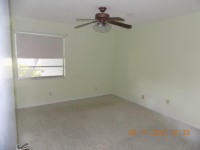 469 Normandy J 469, Delray Beach, FL 33484 - empty room with ceiling fan and speckled floor