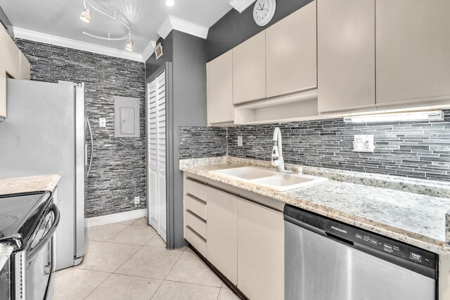 19667 Turnberry Way Unit 10C, Aventura, FL 33180 - kitchen featuring dishwasher, range, light tile patterned flooring, crown molding, and tasteful backsplash