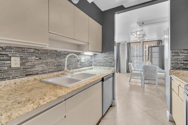 19667 Turnberry Way Unit 10C, Aventura, FL 33180 - kitchen featuring dishwasher, tasteful backsplash, light countertops, and light tile patterned floors