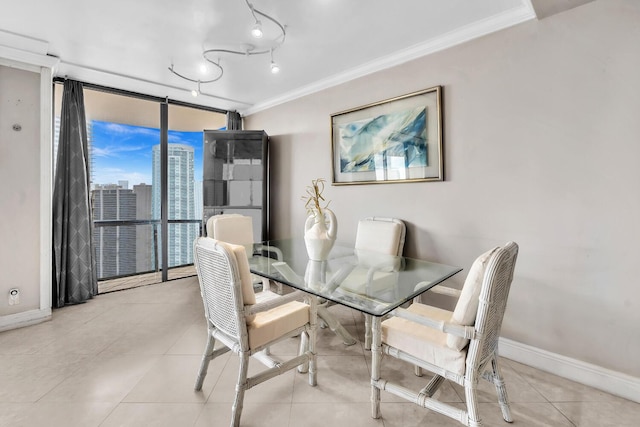 19667 Turnberry Way Unit 10C, Aventura, FL 33180 - dining room with ornamental molding, a view of city, and light tile patterned floors