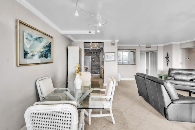 19667 Turnberry Way Unit 10C, Aventura, FL 33180 - dining room featuring crown molding and light tile patterned floors