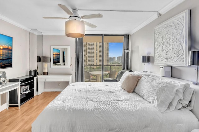 19667 Turnberry Way Unit 10C, Aventura, FL 33180 - bedroom with ornamental molding, light wood finished floors, access to outside, and a ceiling fan