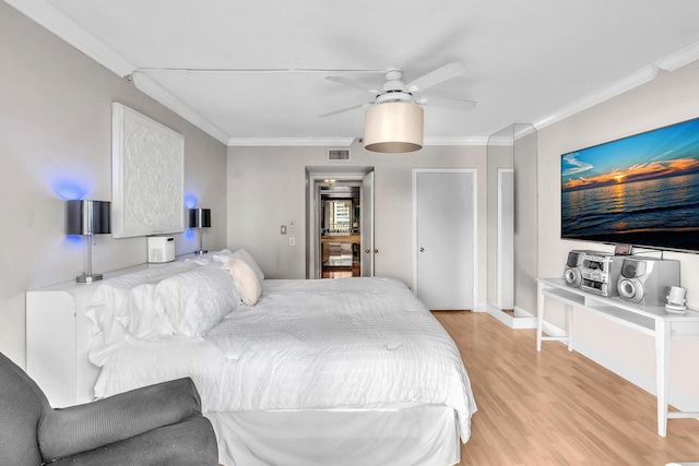 19667 Turnberry Way Unit 10C, Aventura, FL 33180 - bedroom with ornamental molding, light wood-style flooring, and ceiling fan