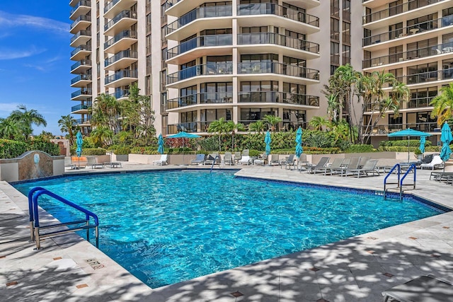 19667 Turnberry Way Unit 10C, Aventura, FL 33180 - community pool featuring a patio area