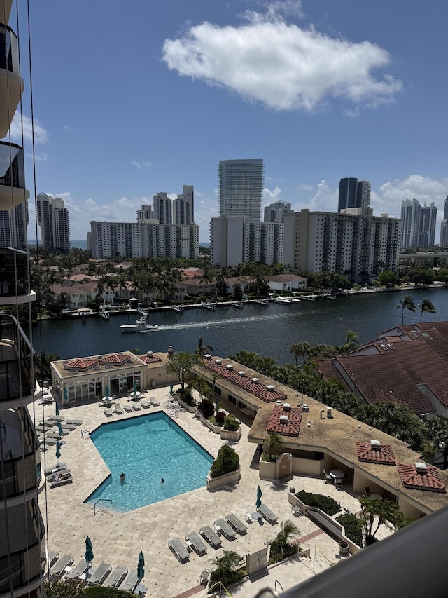 19667 Turnberry Way Unit 10C, Aventura, FL 33180 - community pool featuring a water view, a skyline view, and a patio