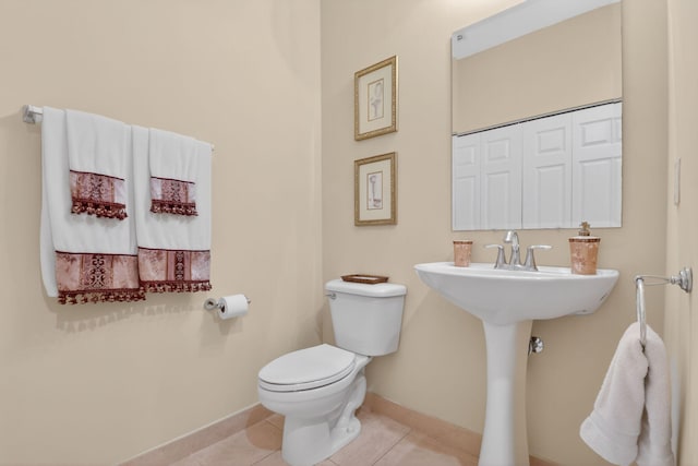 7271 Briella Dr, Boynton Beach, FL 33437 - half bathroom with tile patterned floors and baseboards