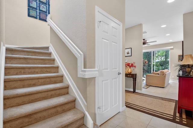 7271 Briella Dr, Boynton Beach, FL 33437 - stairs with tile patterned floors, a ceiling fan, recessed lighting, and carpet flooring