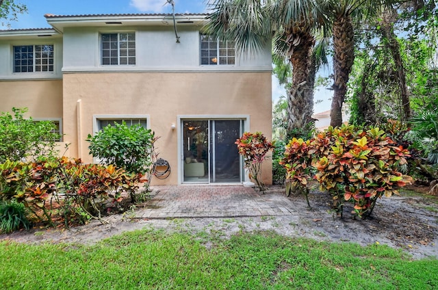 7271 Briella Dr, Boynton Beach, FL 33437 - back of house featuring stucco siding